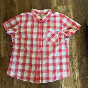 Pink plaid button down shirt.